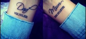 Mum and dad tattoed on wrists